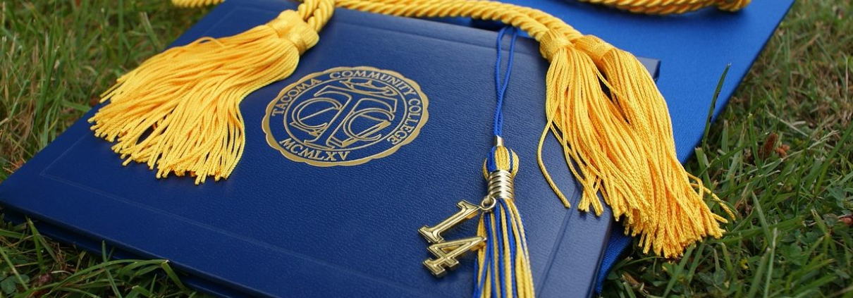 An academic mortarboard hat, representing graduation from further or higher education