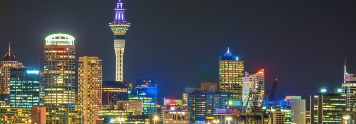 The illuminated skyline of downtown Auckland, New Zealand at night